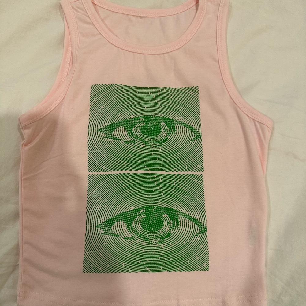 Cute pink tank top with green eyes pattern